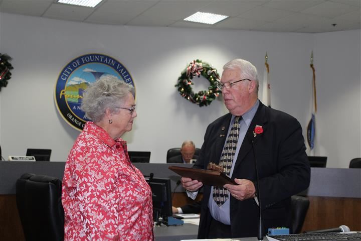 Presentation to outgoing Mayor Brothers by Mayor Pro Tem Collins